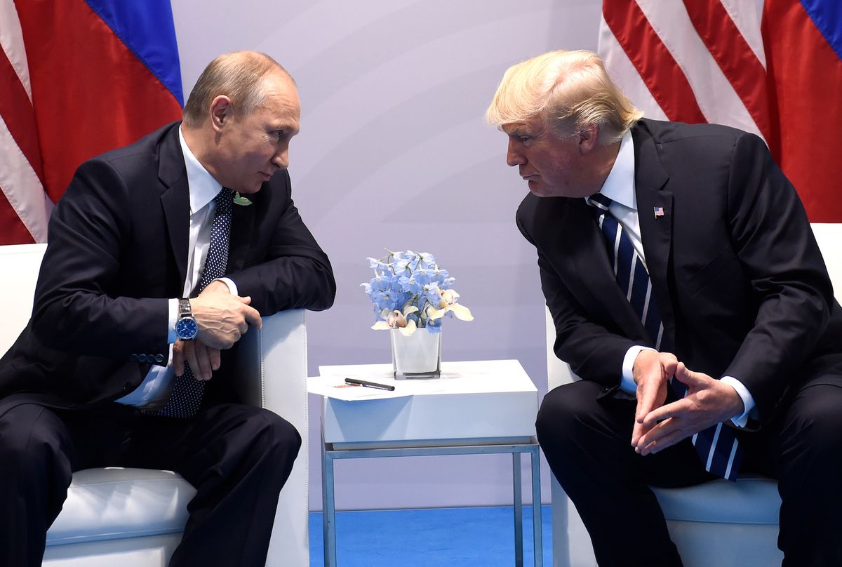 us president donald trump and russia's president vladimir putin hold a meeting on the sidelines of the g20 summit in hamburg, germany, on july 7, 2017  afp photo  saul loeb        photo credit should read saul loebafp via getty images
