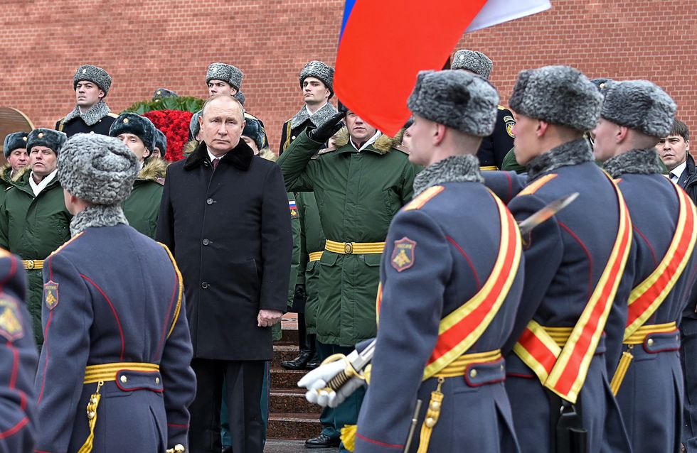 moscow, russia   february 23, 2022 russia's president vladimir putin takes part in a wreath laying ceremony at the tomb of the unknown soldier in moscow's alexander garden on defender of the fatherland day alexei nikolskyrussian presidential press and information officetass photo by alexei nikolsky\tass via getty images