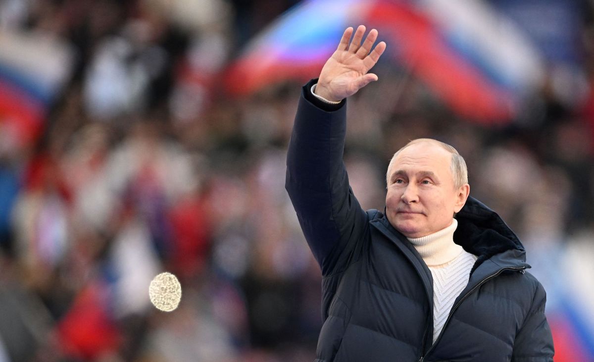 topshot   russian president vladimir putin waves during a concert marking the eighth anniversary of russia's annexation of crimea at the luzhniki stadium in moscow on march 18, 2022 photo by ramil sitdikov  pool  afp photo by ramil sitdikovpoolafp via getty images