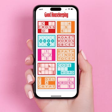 mobile phone displaying a series of puzzle games mobile phone displaying a series of puzzle games