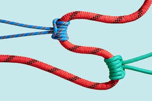 climbing ropes tied together on blue background gut health stomach in knots