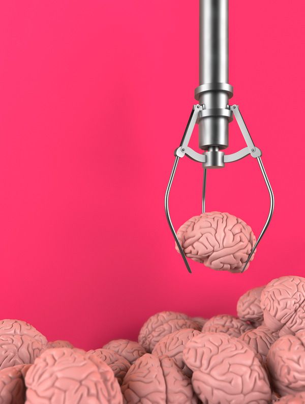 claw machine grabbing a small, plastic brain from pile memory memory loss forgetfulness brain fog