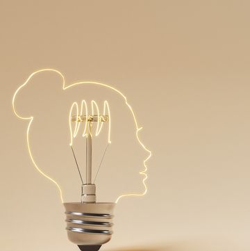 3d rendering of light bulb made in the shape of a woman's profile