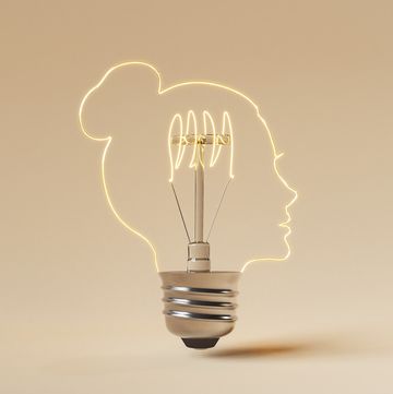 3d rendering of light bulb made in the shape of a woman's profile