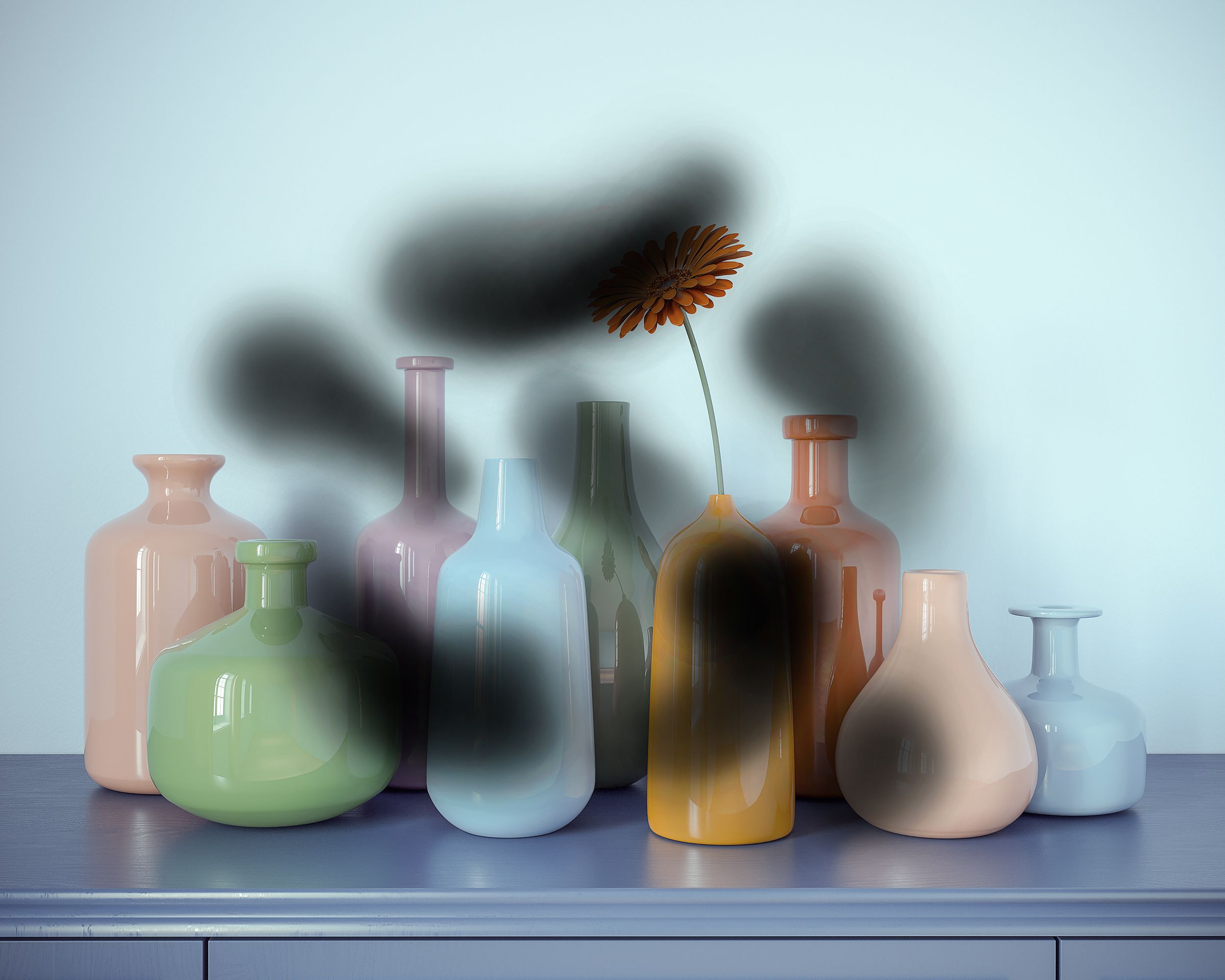 a group of vases with flowers with black splotches