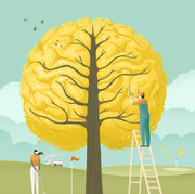 man clipping tree in shape of brain