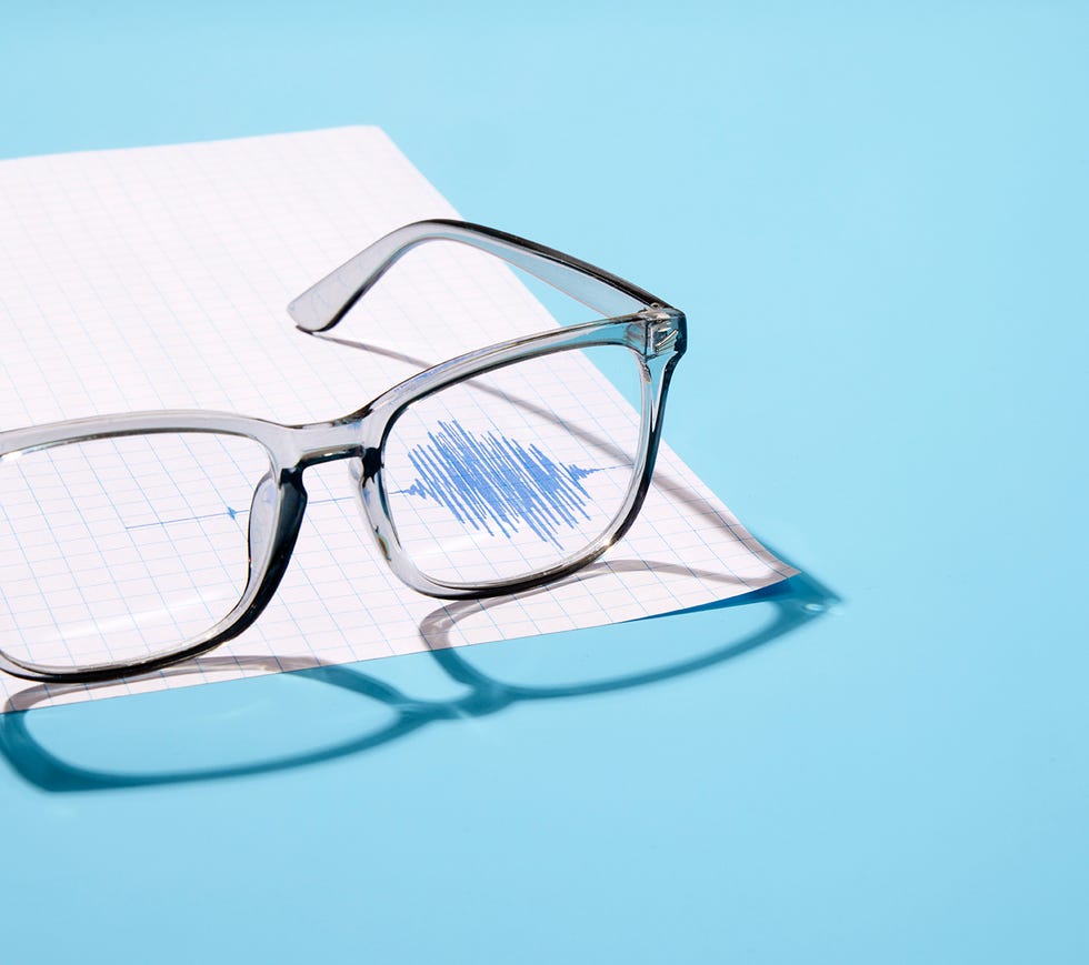 a pair of glasses on a blue background