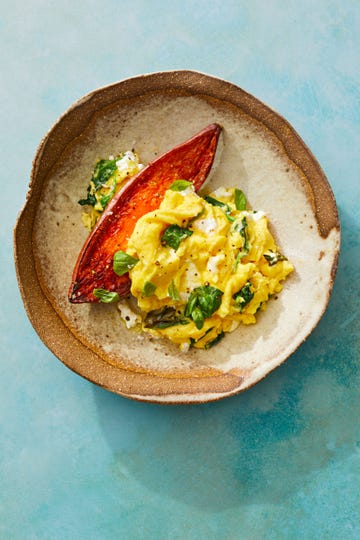 soft scrambled eggs with spinach on sweet potatoes