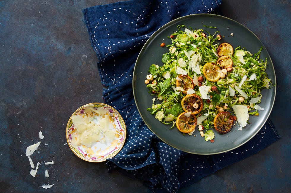 shaved brussels sprout salad with hazelnuts, broiled lemon and pecorino