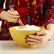 ree drummond baking with mixing bowl and whisk