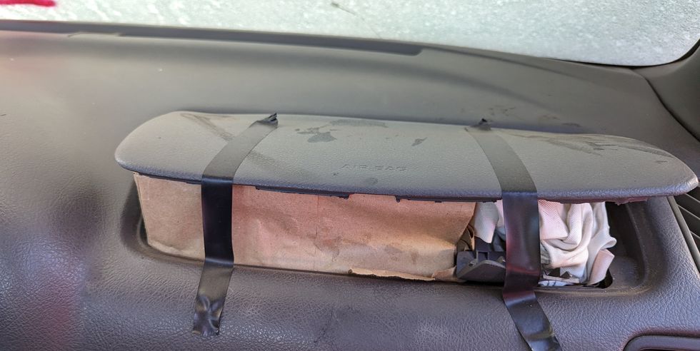 2001 chevrolet metro with taped airbags