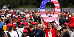 wilkes barre, pa   august 02 david reinert holds up a large "q" sign while waiting in line on august 2, 2018 at the mohegan sun arena at casey plaza in wilkes barre, pennsylvania to see president donald j trump at his rally "q" is a conspiracy theory group that has been seen at recent rallies    photo by rick loomisgetty images