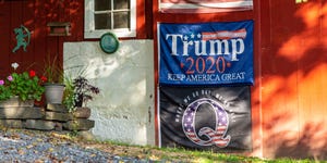 danville, pennsylvania, united states   20201021 an american flag, a trump re election flag, and a qanon flag are displayed on a barn in central pennsylvania photo by paul weaverpacific presslightrocket via getty images