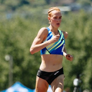 an athlete in motion during a running competition an athlete in motion during a running competition