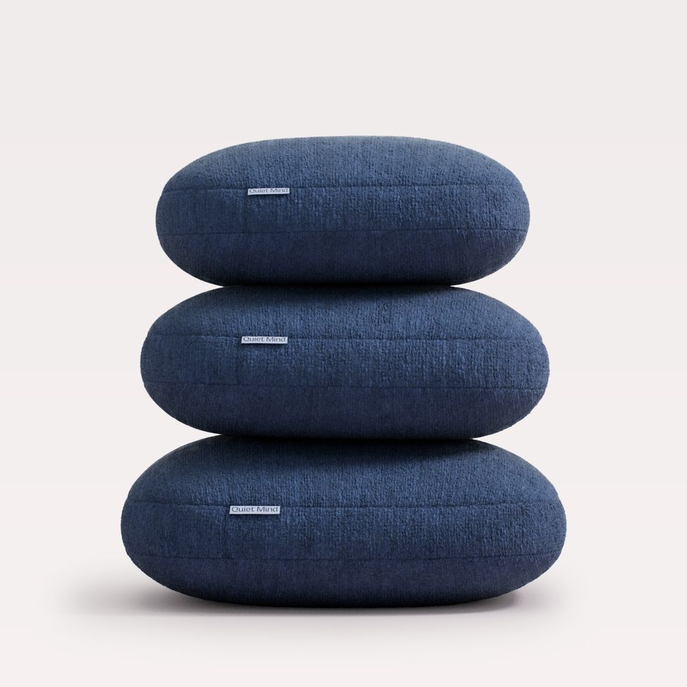 three blue pillows stacked