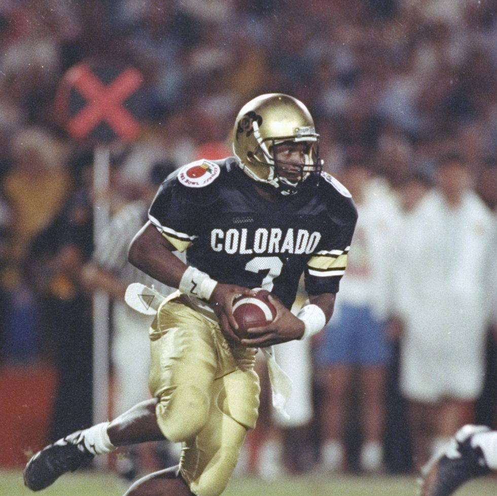 quarterback darian hagan of the colorado buffaloes runs down the field during a game against the notre dame fighting irish at the orange bowl in miami, florida colorado won the game 109