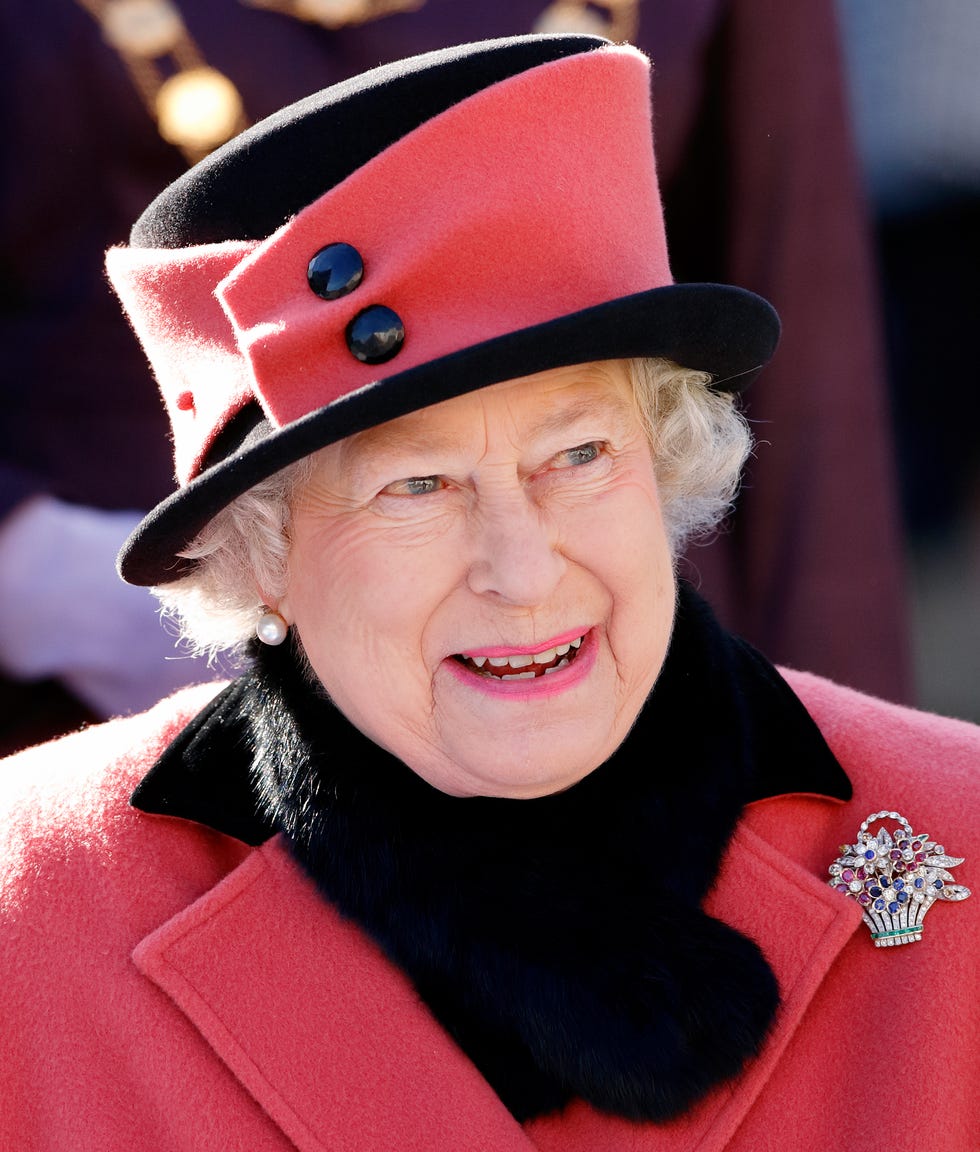 crawley, united kingdom   november 03 embargoed for publication in uk newspapers until 24 hours after create date and time queen elizabeth ii wearing her flower basket brooch visits queens square during the sixtieth anniversary celebrations of crawley new town on november 3, 2006 in crawley, england photo by max mumbyindigogetty images