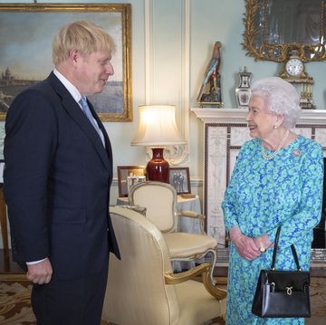 london, england   july 24 queen elizabeth ii welcomes newly elected leader of the conservative party, boris johnson during an audience where she invited him to become prime minister and form a new government in buckingham palace on july 24, 2019 in london, england the british monarch remains politically neutral and the incoming prime minister visits the palace to satisfy the queen that they can form her government by being able to command a majority, holding the greater number of seats, in parliament then the court circular records that a new prime minister has been appointed  photo by victoria jones   wpa poolgetty images