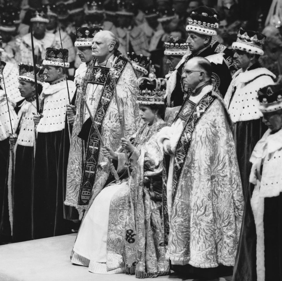 2nd june 1953 queen elizabeth ii seated upon the throne at her coronation in westminster abbey, london she is holding the royal sceptre ensign of kingly power and justice and the rod with the dove symbolising equity and mercy photo by topical press agencygetty images