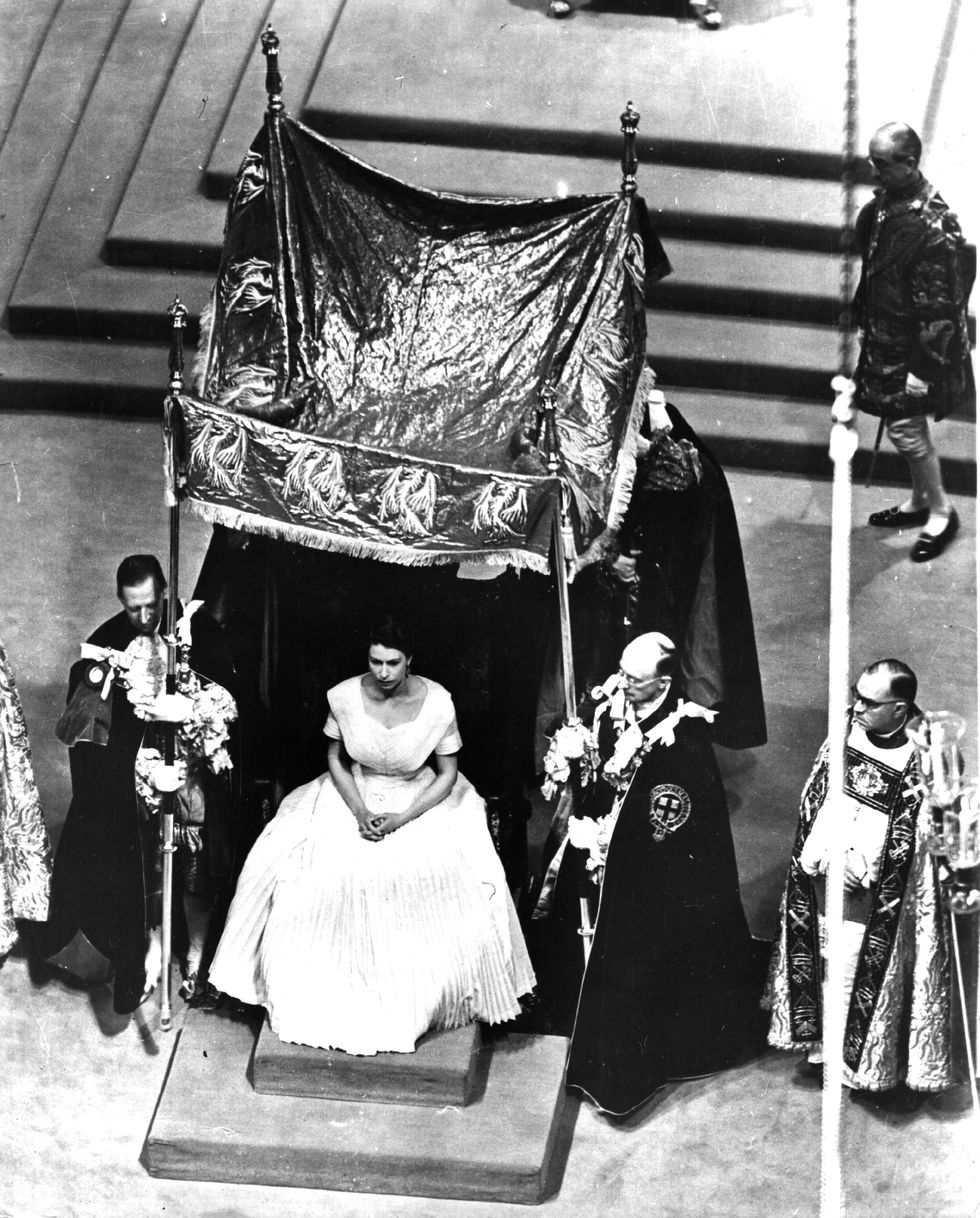 the canopy is placed over queen elizabeth ii for the anointing ceremony during her coronation