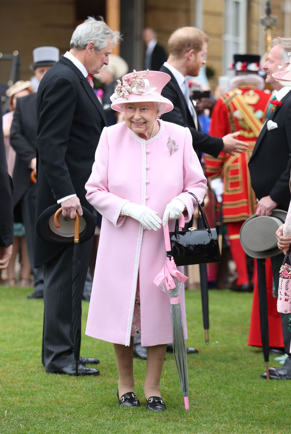 queen elizabeth garden party buckingham palace umbrella
