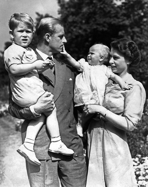 Queen Elizabeth II and her husband Prince Philip with their two children Prince Charles and Princess Anne. Circa 1951.