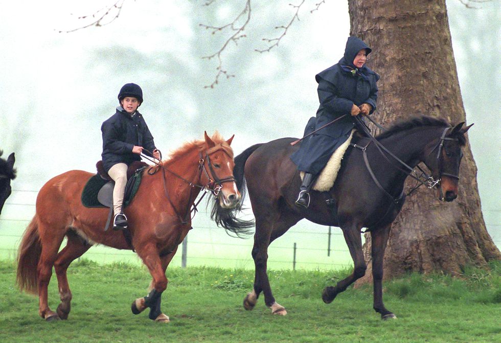 queen elizabeth ii, and princess beatrice riding at windsor