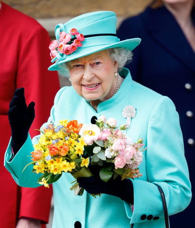 The Queen has a fake hand for waving to her fans