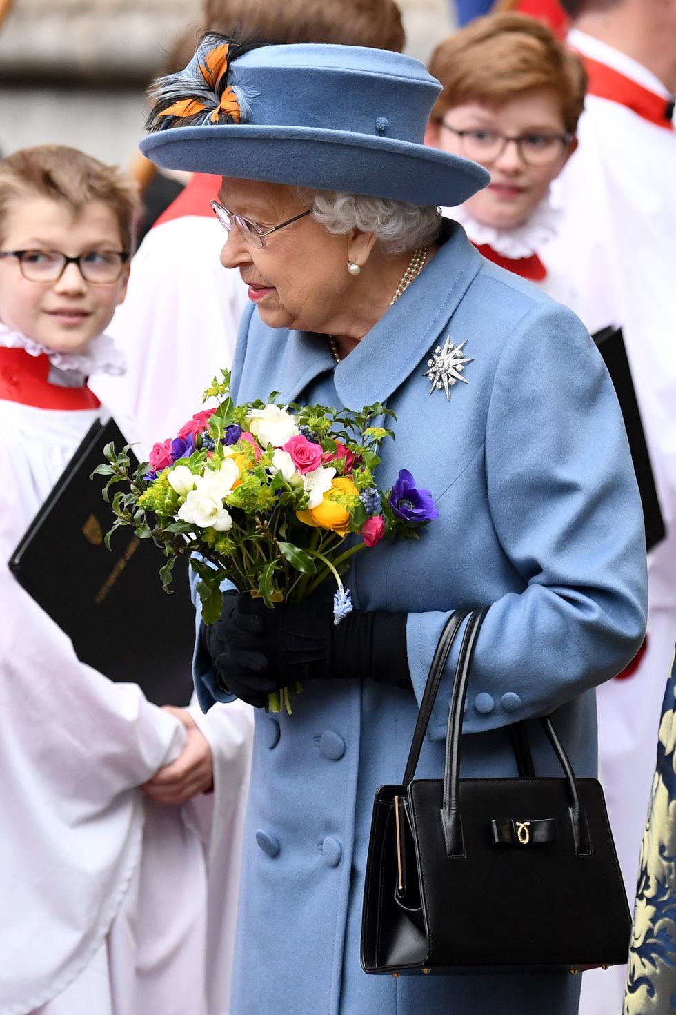 Her Majesty Queen Elizabeth II in bright purple outfit and black purse,  Stock Photo, Picture And Rights Managed Image. Pic. VOA-VOA71-2259 |  agefotostock