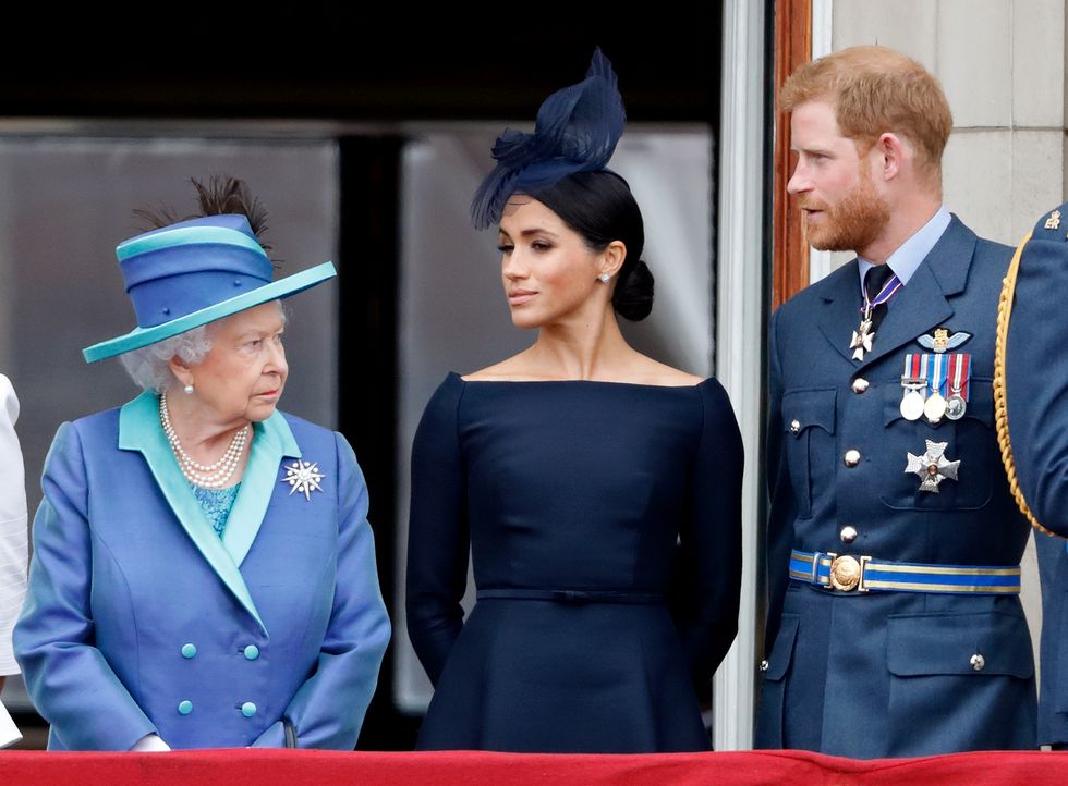 ﻿elisabetta ii, meghan markle e il principe harry al balcone di buckingham palace, luglio 2018
