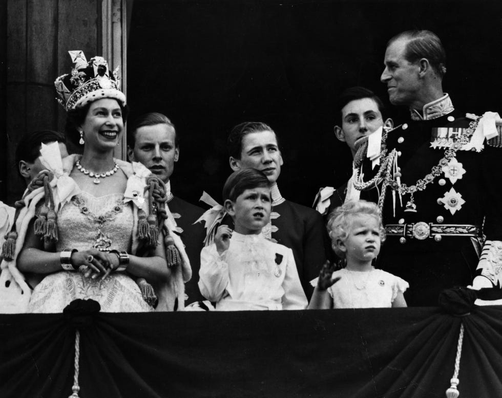 queen elizabeth ii with prince charles on the balcony after her coronation