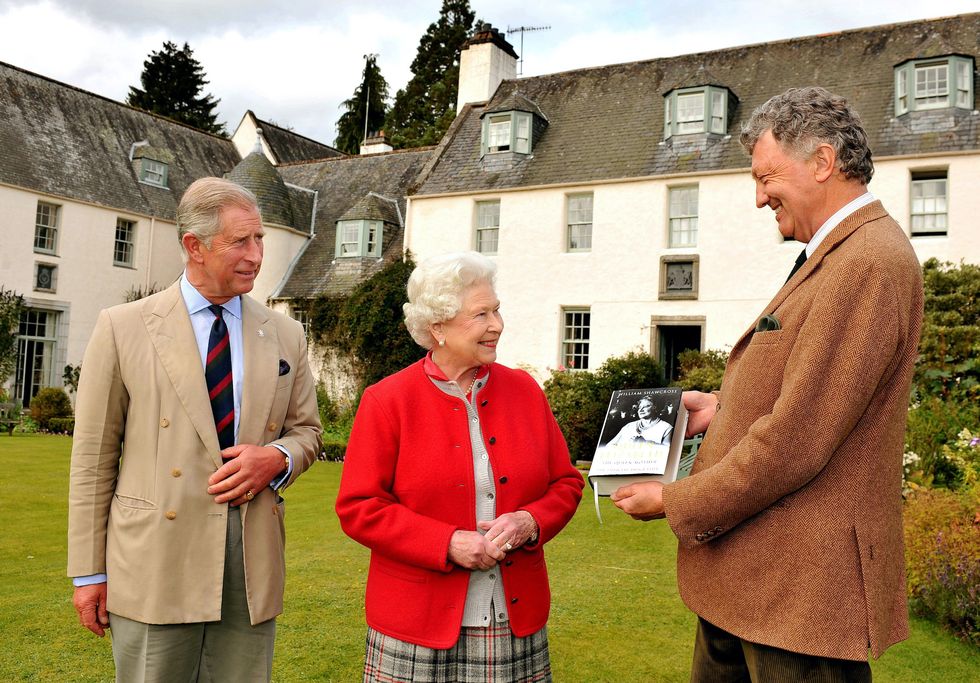 queen elizabeth ii and prince charles in the garden at birkhall