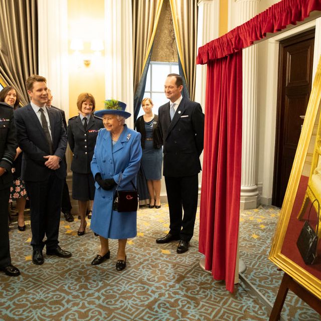 The Queen Visits The Royal Air Force Club To Mark Its Centenary Year