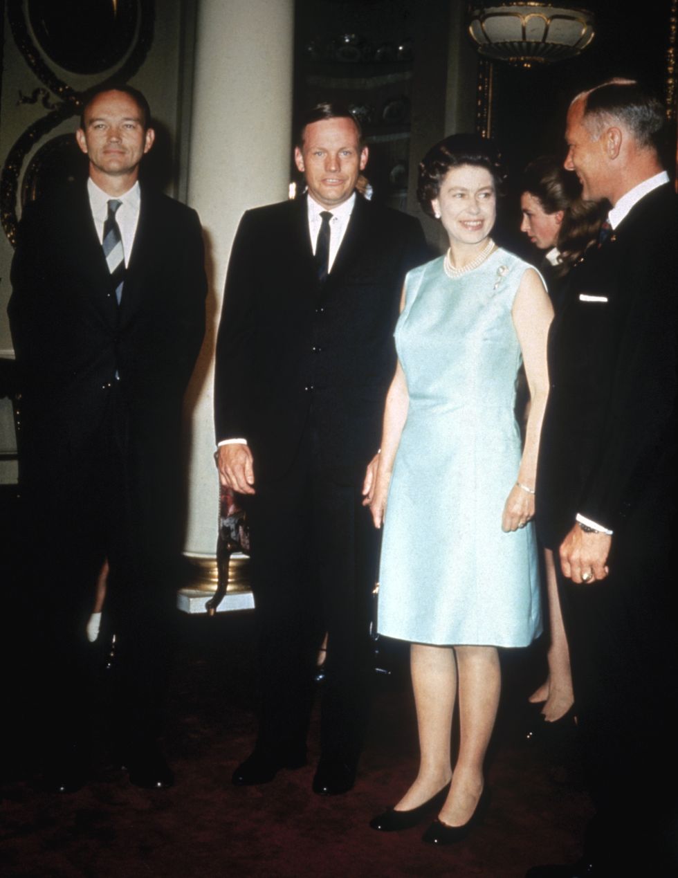 Queen Elizabeth II with the Apollo 11 astronauts Michael Collins, Neil Armstrong, and Edwin "Buzz" Aldrin at Buckingham Palace, 1970. 