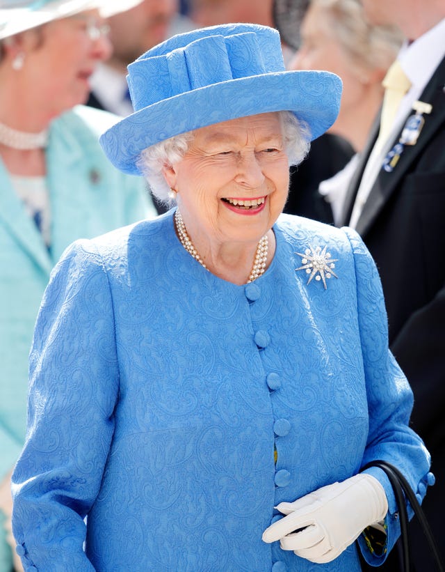 The Queen giggles at serviceman's lockdown exercise regime in video chat