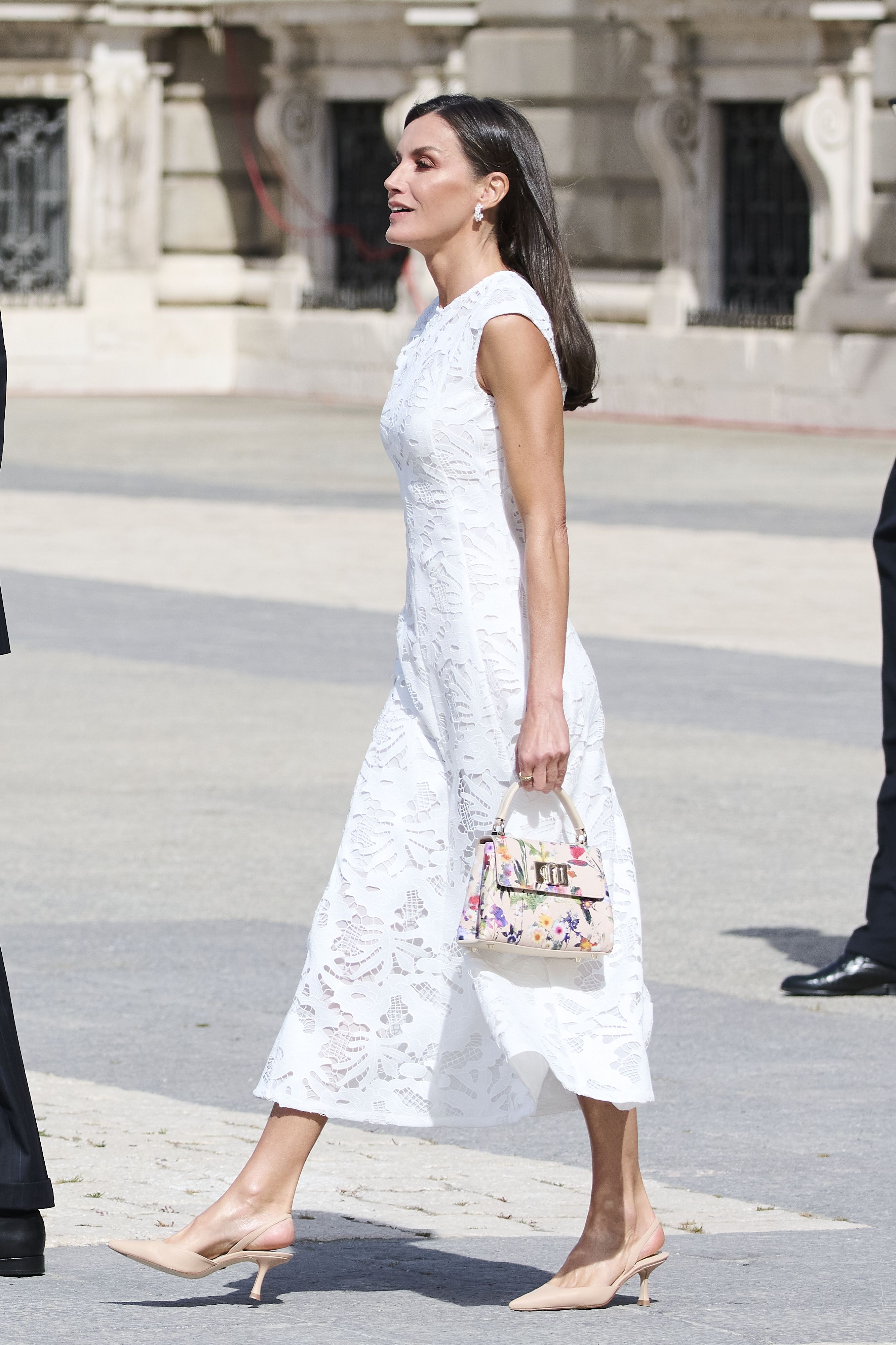 Queen Letizia debuts chic COS draped-neck ribbed wool dress for