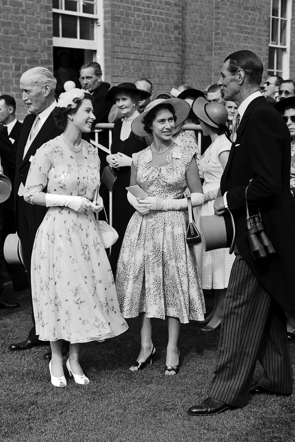 queen elizabeth ii and princess margaret greet trainer noel murless