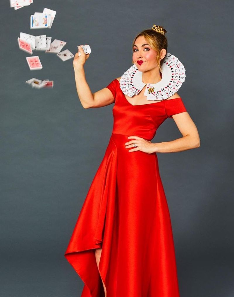 easy halloween costume woman wearing a red dress and holding a deck of cards