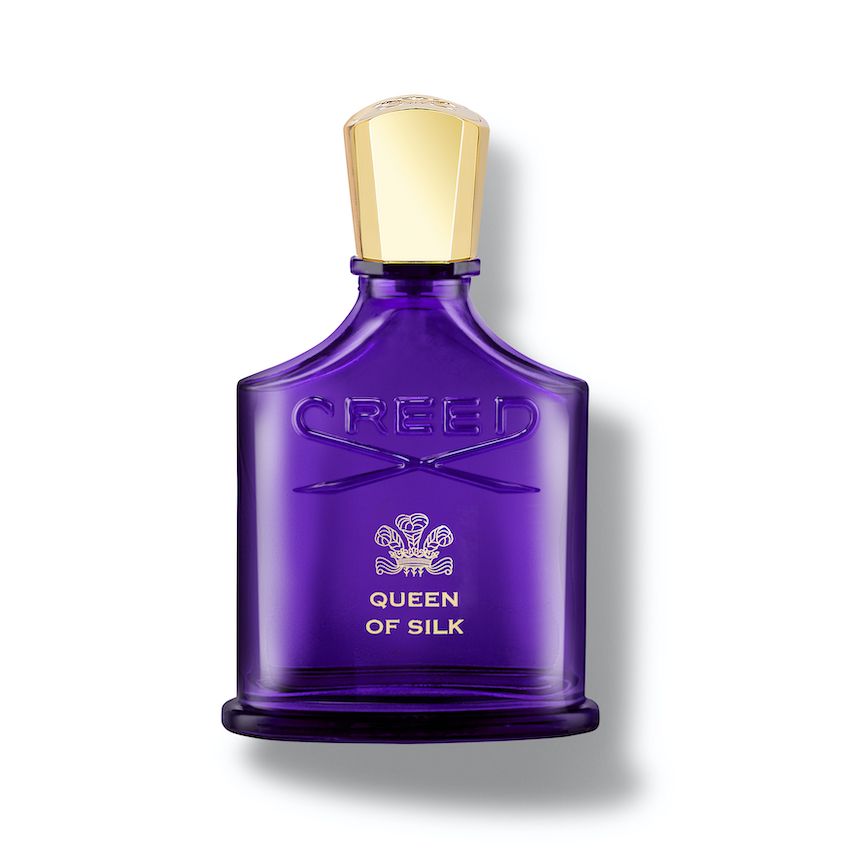 a purple bottle of perfume
