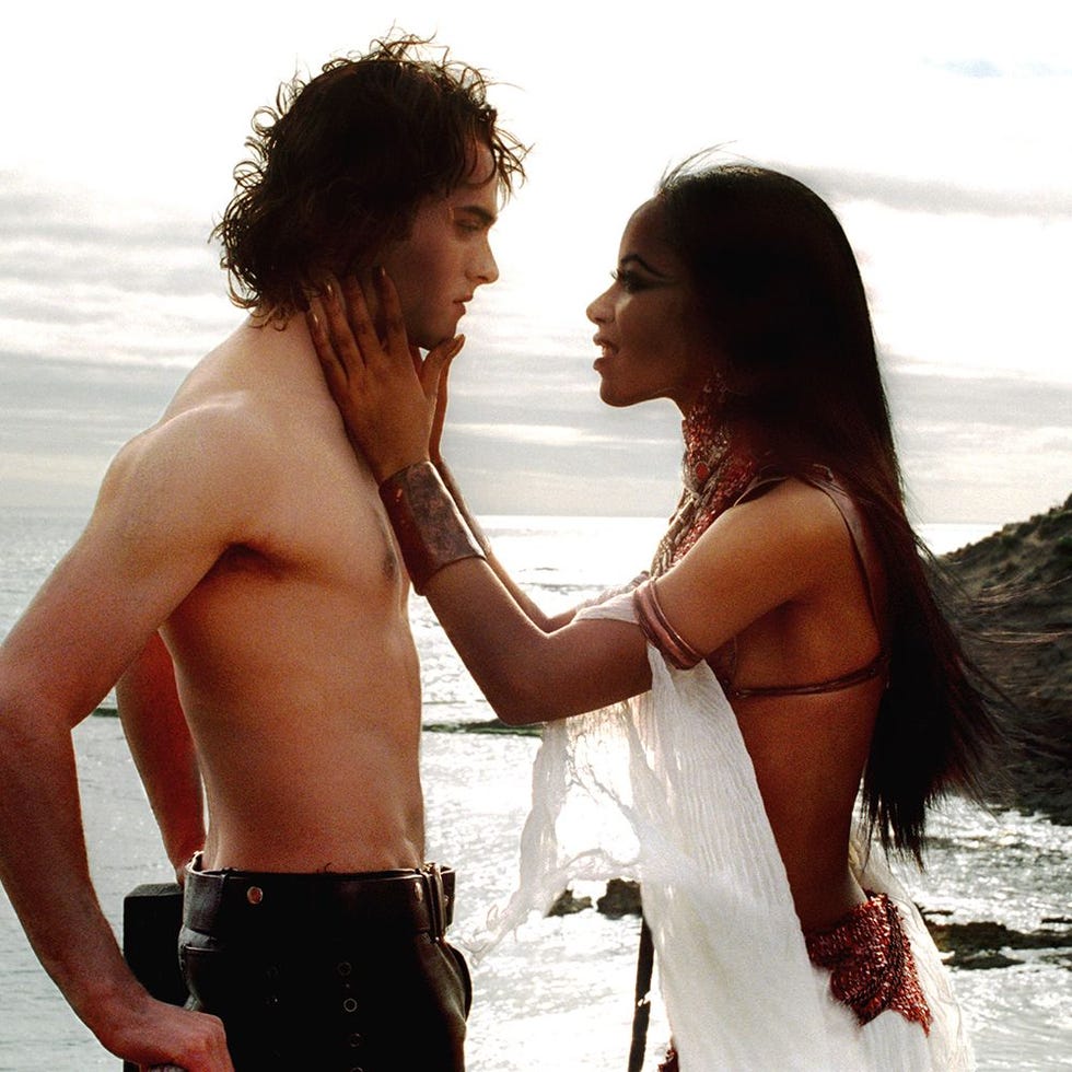 a romantic interaction between two individuals by the ocean