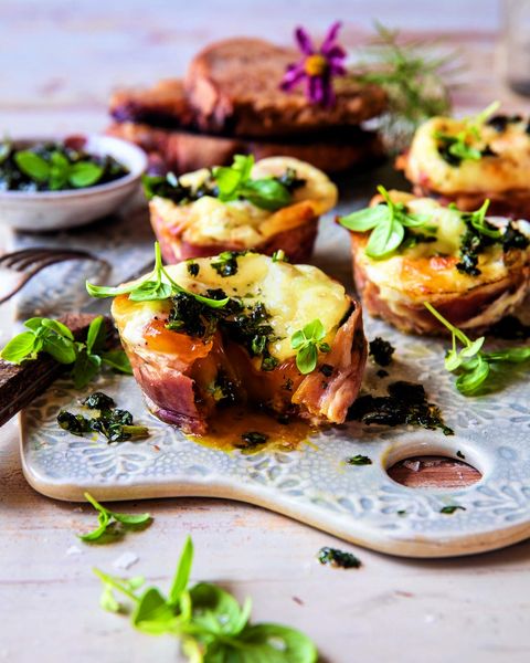 prosciutto breakfast cups with greens on tray