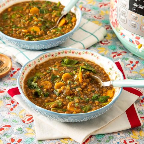 instant pot lentil soup in light blue bowl