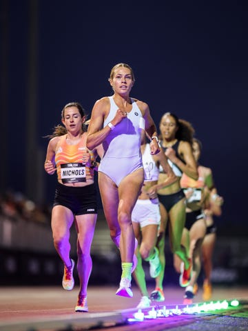 quigley leads a group of track runners