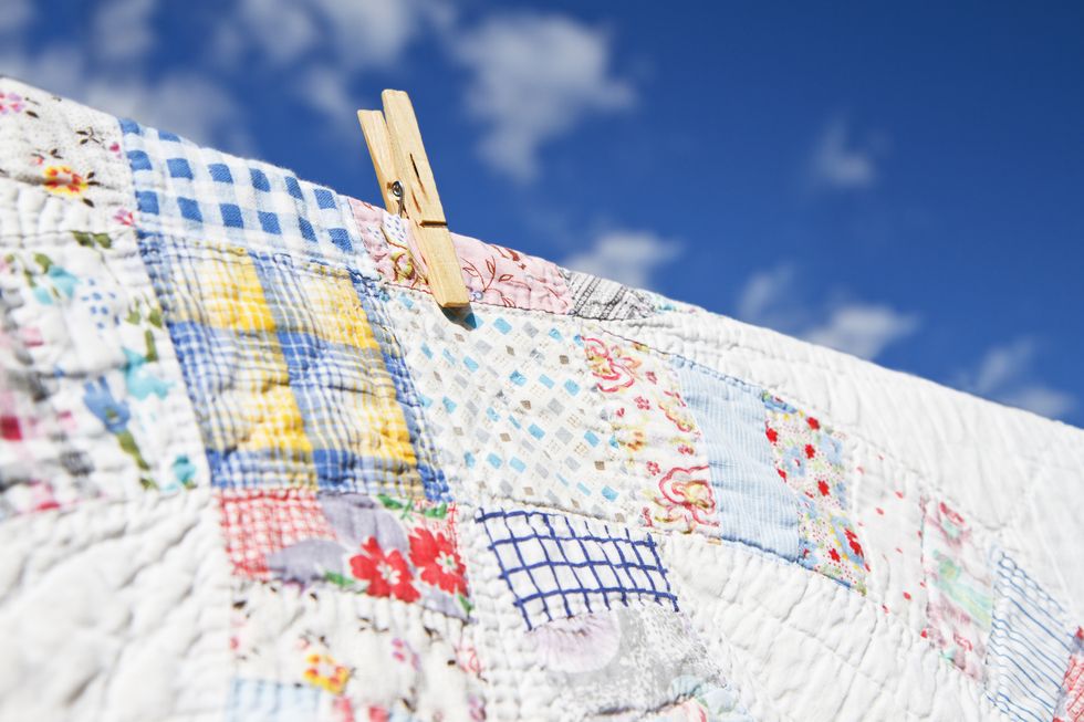 Quilts Drying On A Clothesline