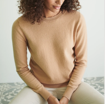 two women wearing crewneck long sleeve cashmere sweaters