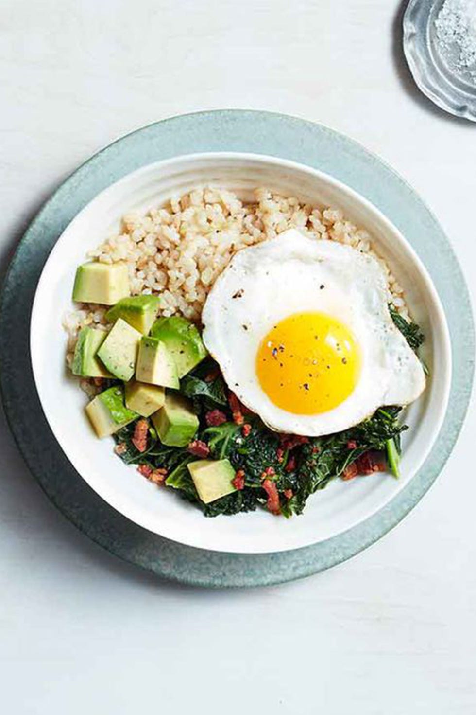 avocado bacon kale and egg grain bowl