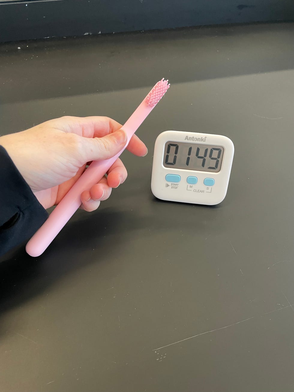 testing the quip toothbrush at good housekeeping