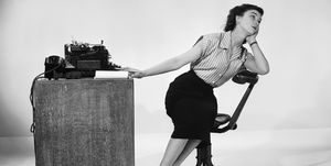 3rd february 1953  a model posing with a selection of office equipment  photo by chaloner woodsgetty images