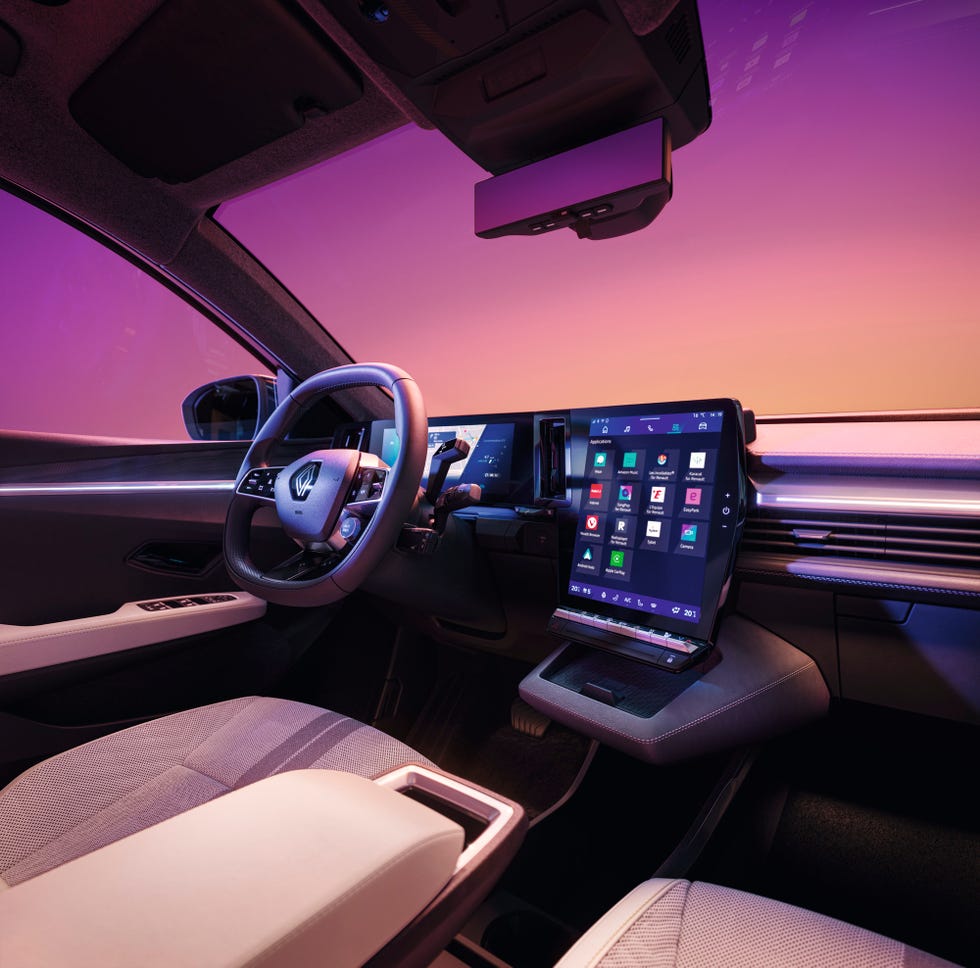 a car with a screen and steering wheel