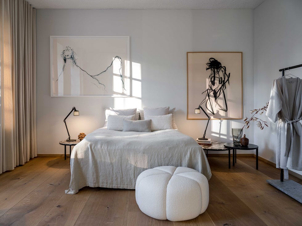 modern bedroom featuring a bed artwork and stylish decor